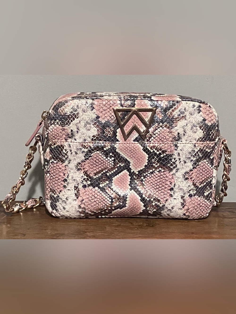 Kelly Wynne Mingle Mingle Mini bag in the Pink Python print